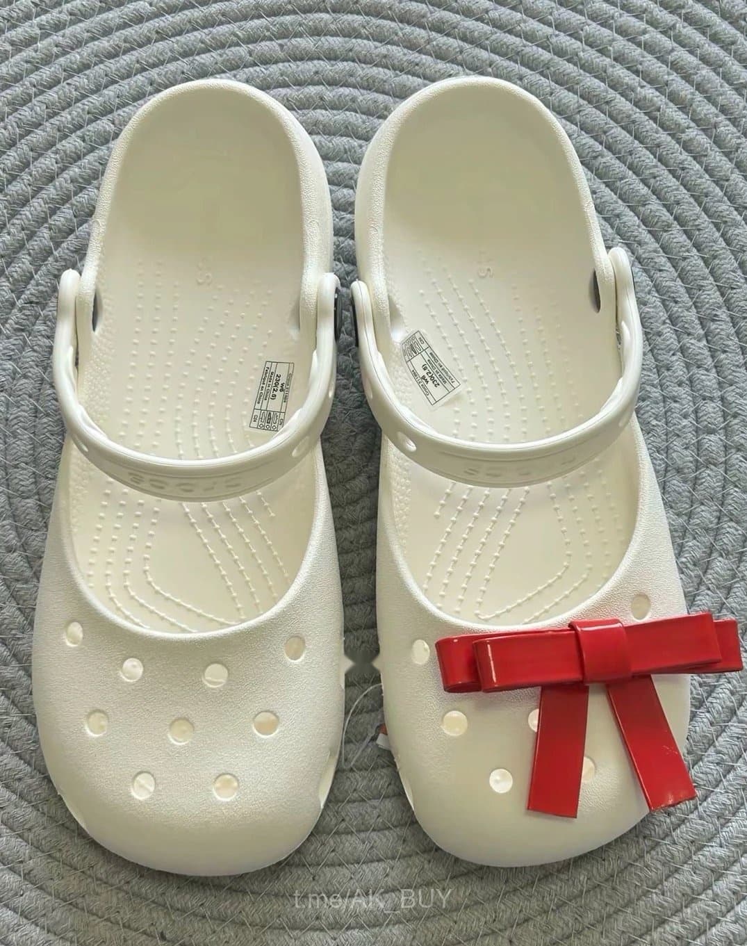 Crocs White Rubber Red Bow Clogs