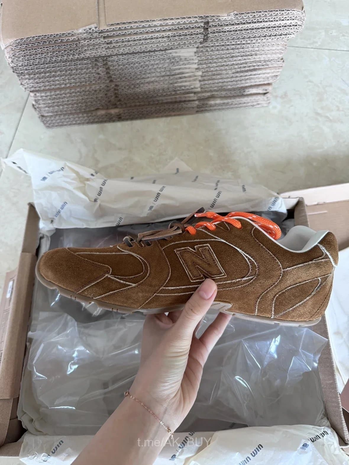 New Balance Brown Suede Sneakers