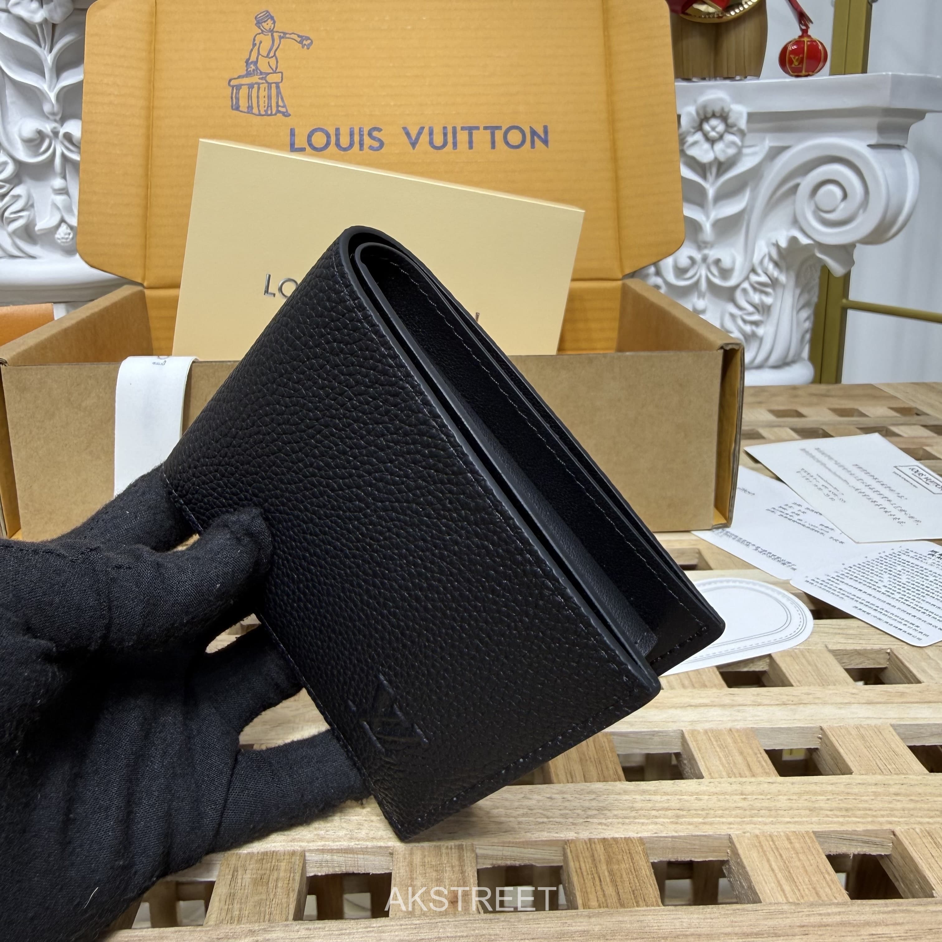 Louis Vuitton Black Leather Wallet
